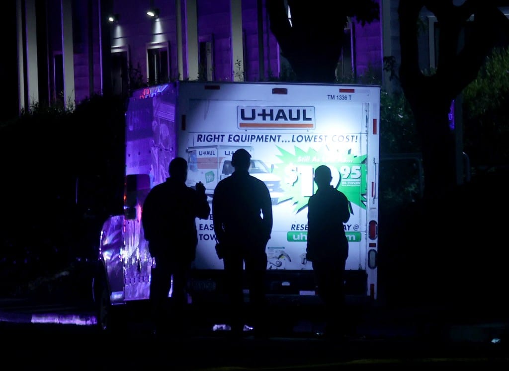 Two Injured When Security Opens Fire on Truck Near Coast Guard Island Amid Immigration Protest