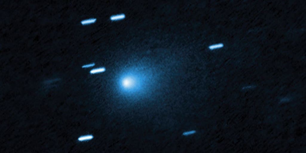 Interstellar Comet 3I/ATLAS Shows Unexpected Acceleration and Blue Hue Near the Sun