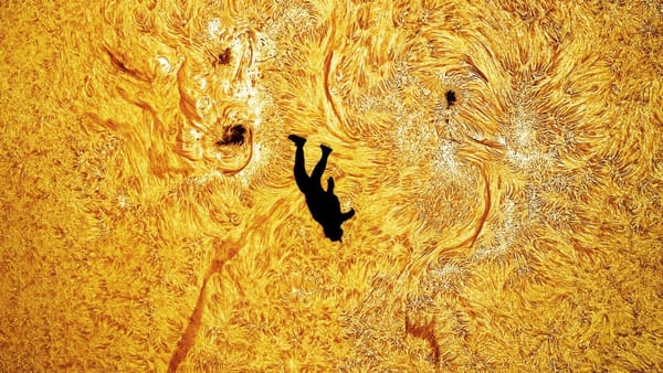 Astrophotographer Captures Stunning Image of Skydiver Appearing to Fall Past Sun's Surface